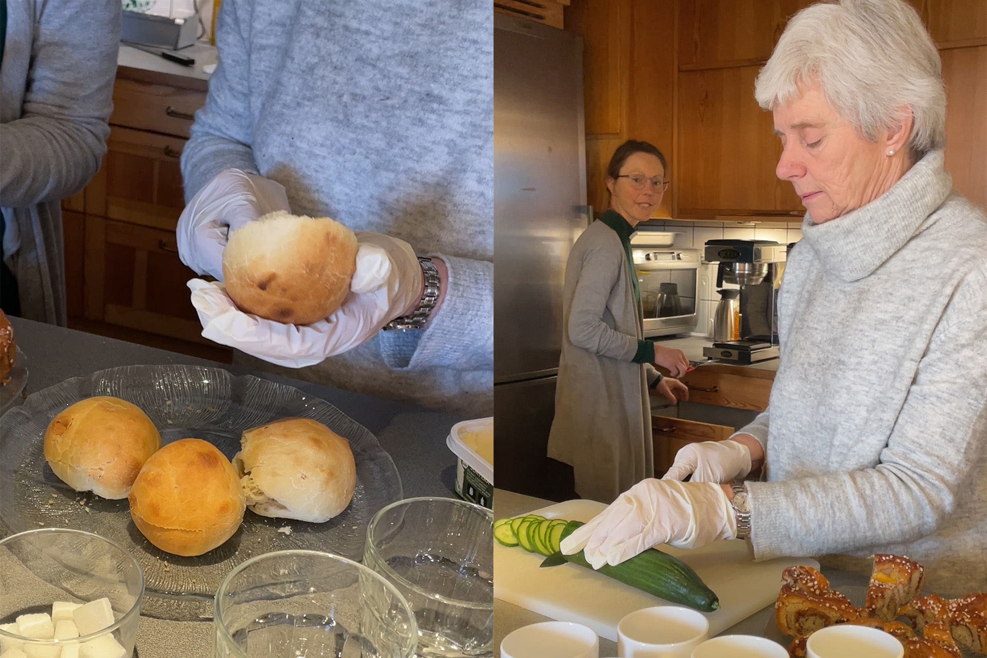 En person brer smörgåsar, en kvinna skär gurka. 